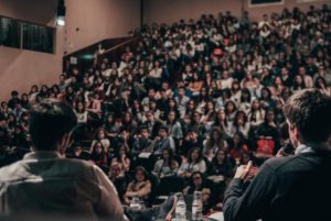 large crowd at auditorium - build an audience