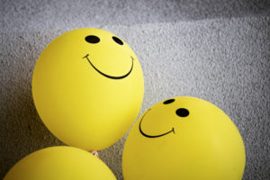 happy face balloons meaning positive