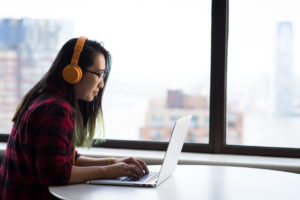 person listening and transcribing